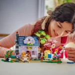 LEGO® Friends - Casa apicultorilor si gradina cu flori 42669, 1161 piese - imagine 5
