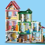 LEGO® Friends - Apartamente si magazine in orasul Heartlake 42670, 2040 piese - imagine 7